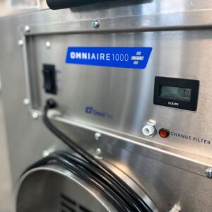 Omni CleanAir OA1000 PLUS-A control panel closeup with audible alarm and filter indicators