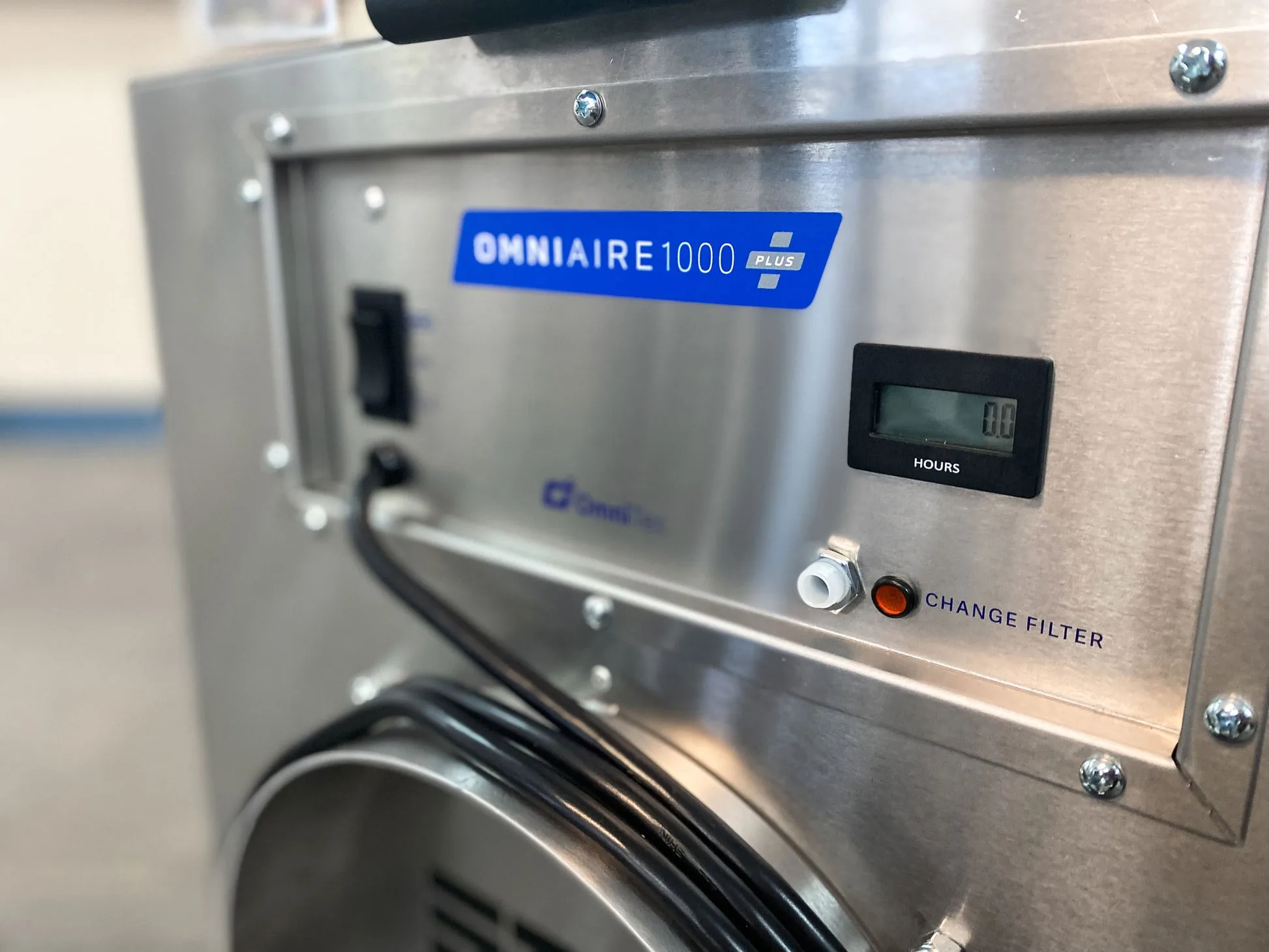 Omni CleanAir OA1000 PLUS-A control panel closeup with audible alarm and filter indicators
